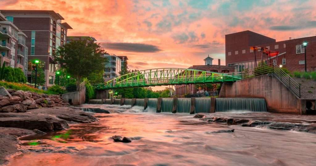 Downtown Greenville SC neighborhood at sunset overlooking Falls Park at Reedy