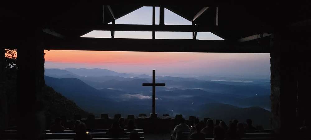 Fred W Symmes Chapel in cleveland south carolina at sunset with the cross in the background