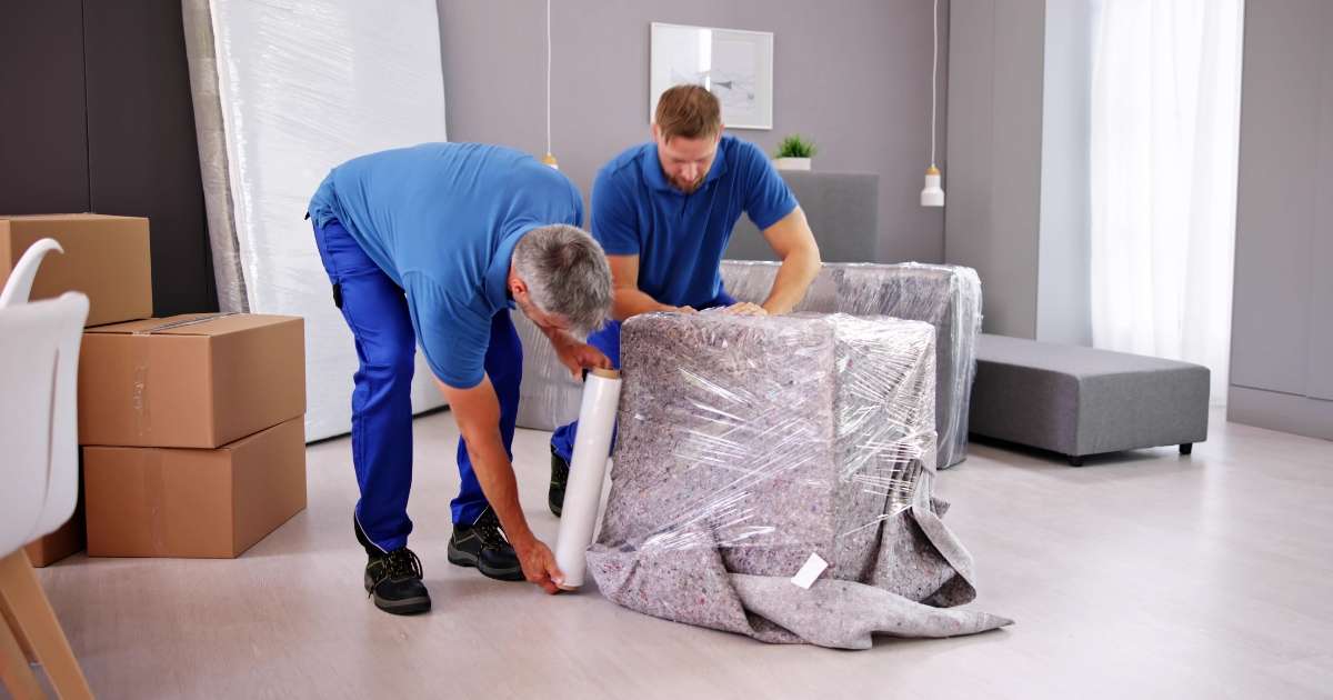 Greenville intrastate movers packing furniture.