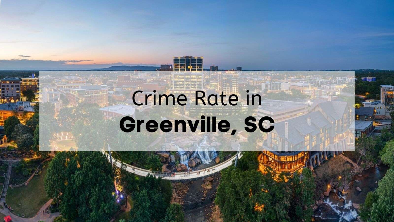 The view of downtown greenville at dusk with the words “crime rate in greenville sc” written across it